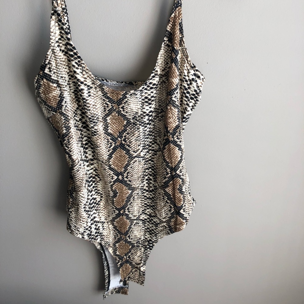 Brown/Tan snake print bodycon bodysuit.